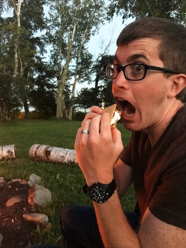 guy eating smore