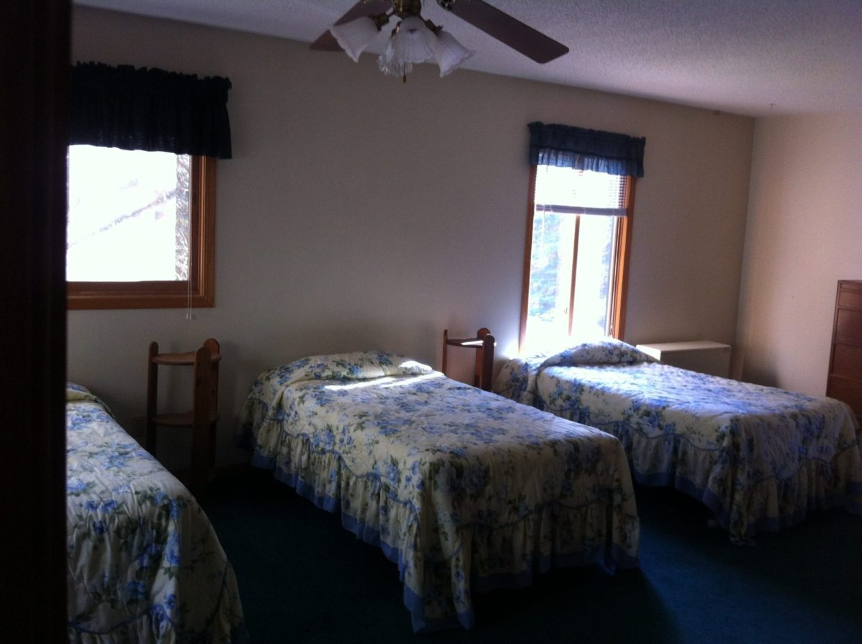 Cabin bedroom at Everett Bay Lodge