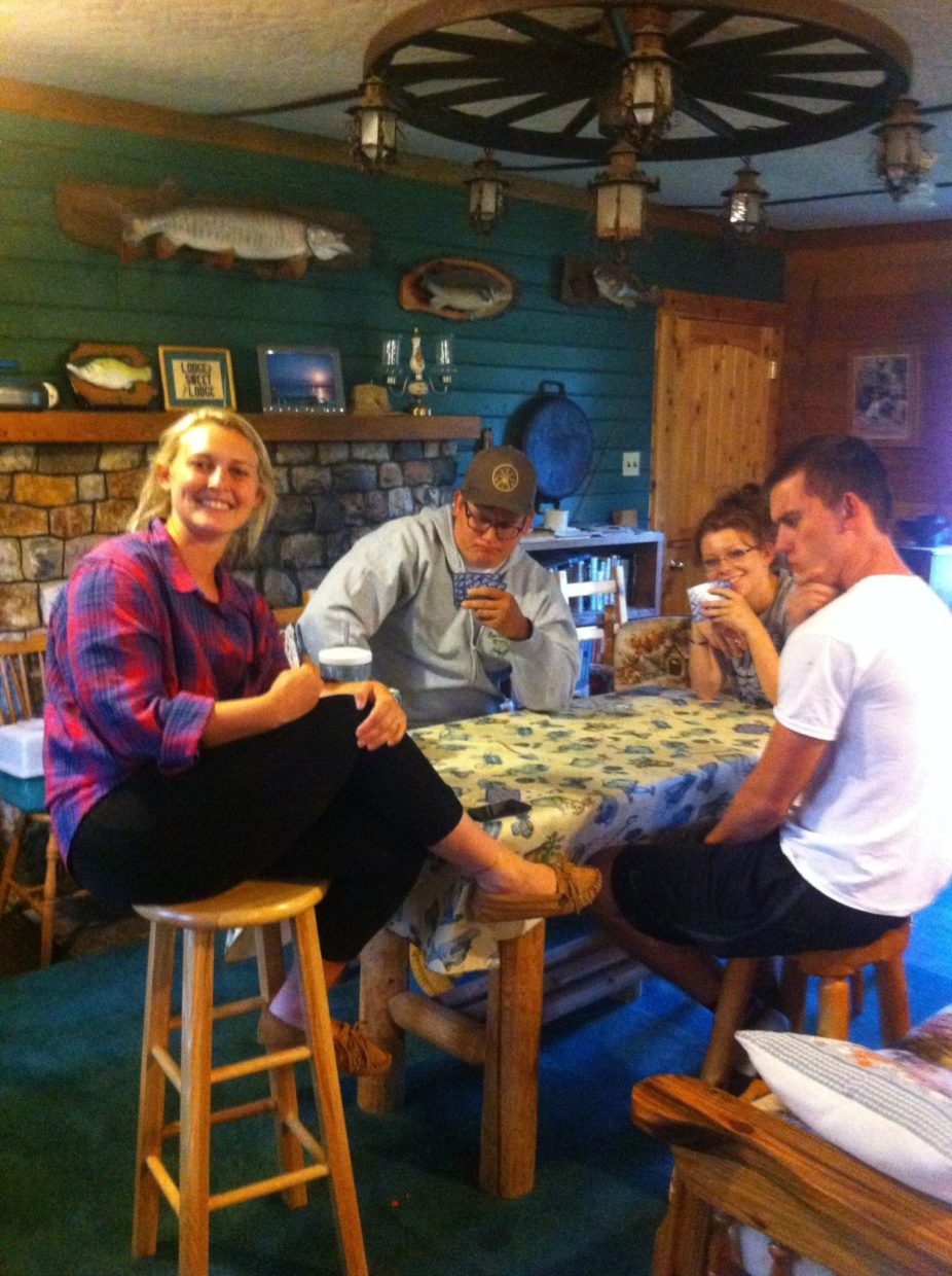 Kids playing euchre in the lodge