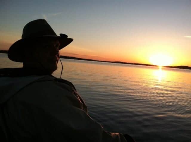 man with sunset on Lake Vermilion