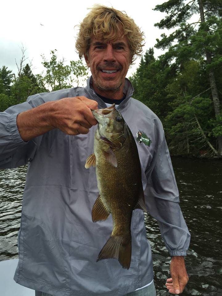 Man holding Lake Vermilion bass caught