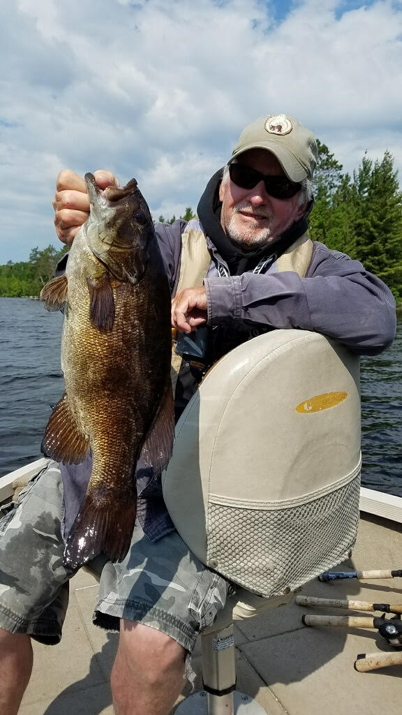 Man holding Lake Vermilion smallmouth bass