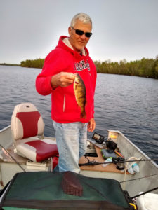 Man with jumbo perch