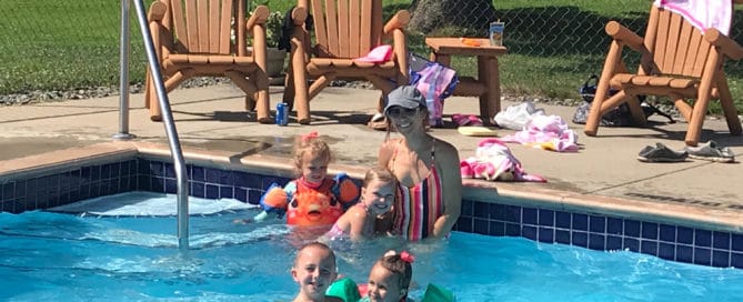 Family in pool at Everett Bay Lodge