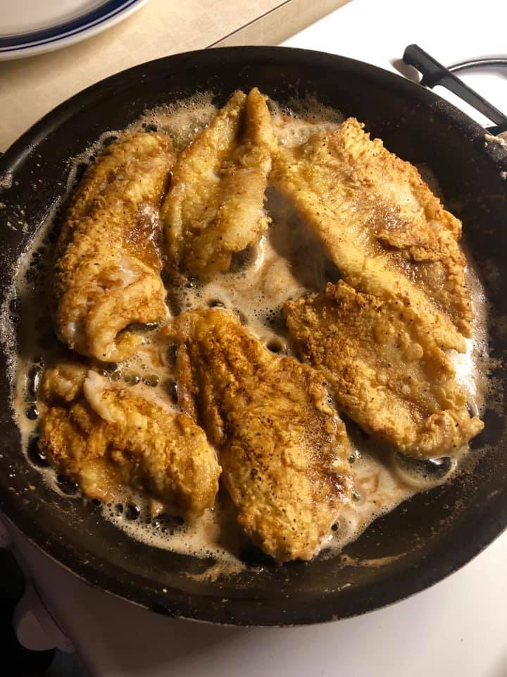 Skillet of fried fish